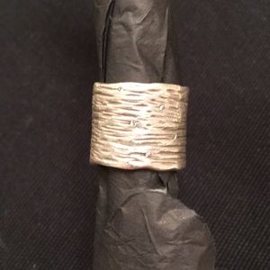 One of a kind precious metal with diamonds.